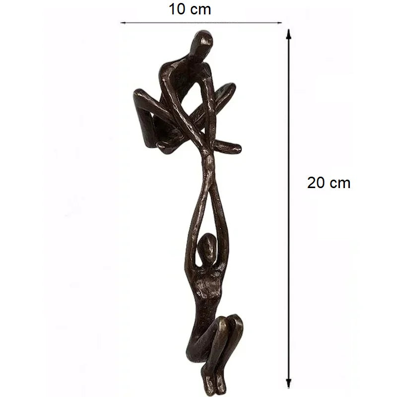 Figura de hombre levantando a mujer, estatua artística