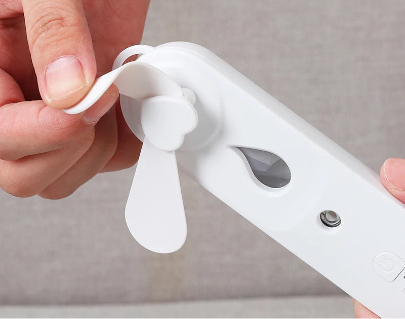 Mini ventilador de mano con difusor