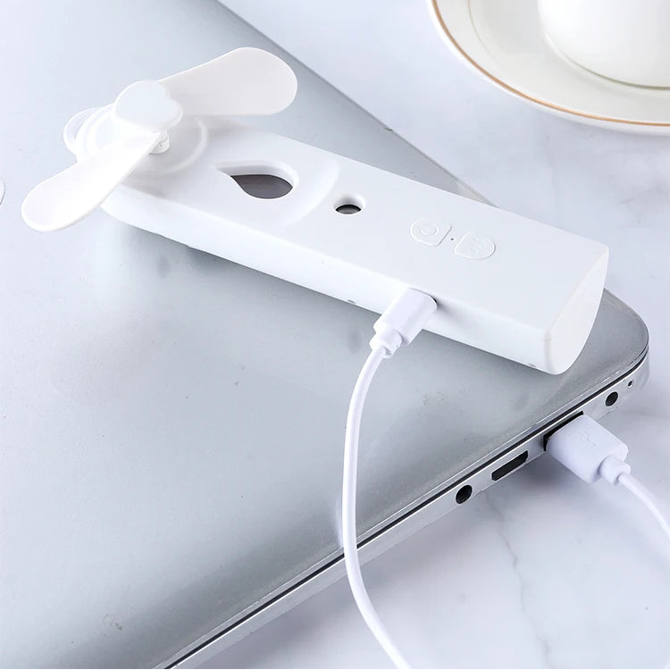 Mini ventilador de mano con difusor
