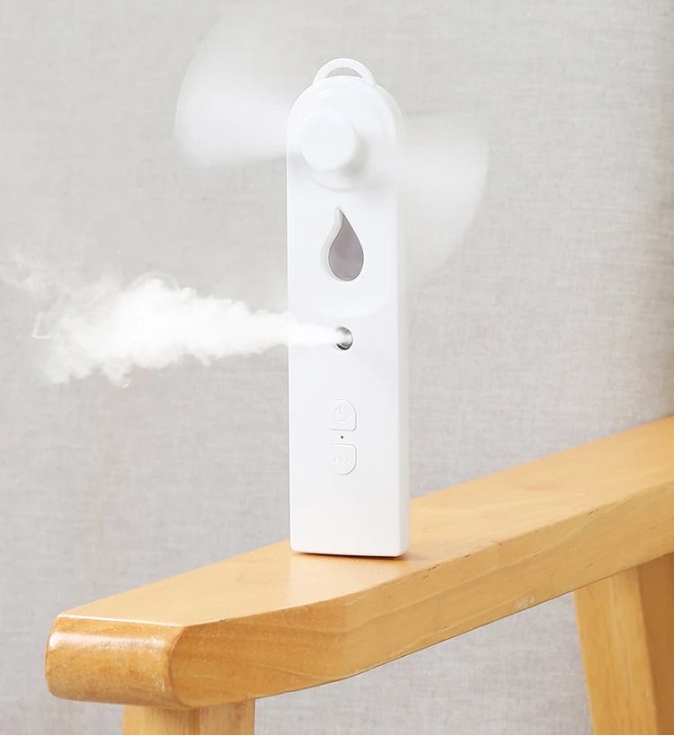 Mini ventilador de mano con difusor