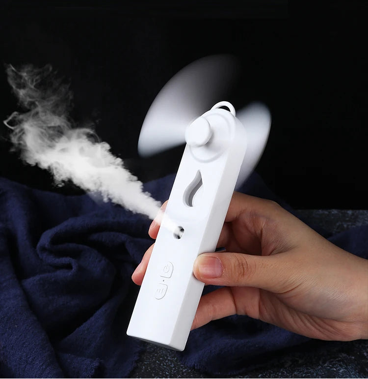 Mini ventilador de mano con difusor