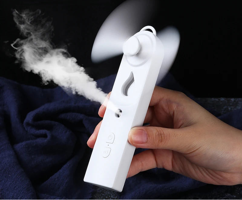 Mini ventilador de mano con difusor
