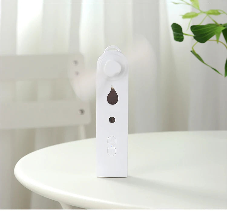 Mini ventilador de mano con difusor