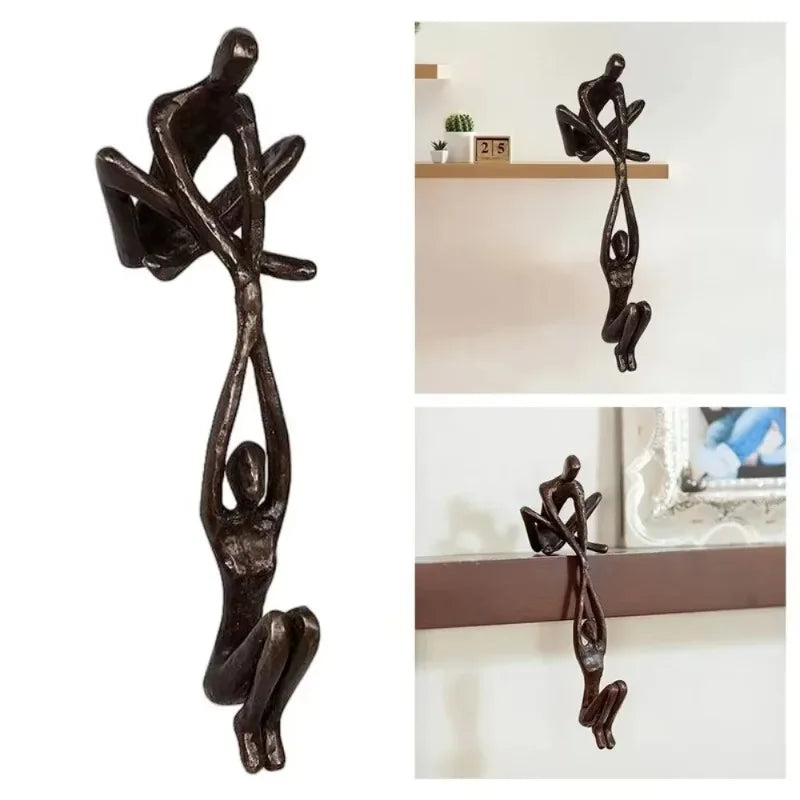 Figura de hombre levantando a mujer, estatua artística