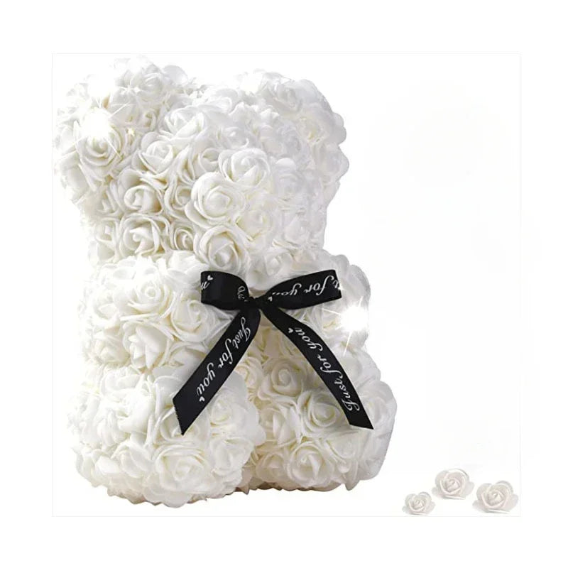 Osito de peluche con rosa eterna de flores artificiales